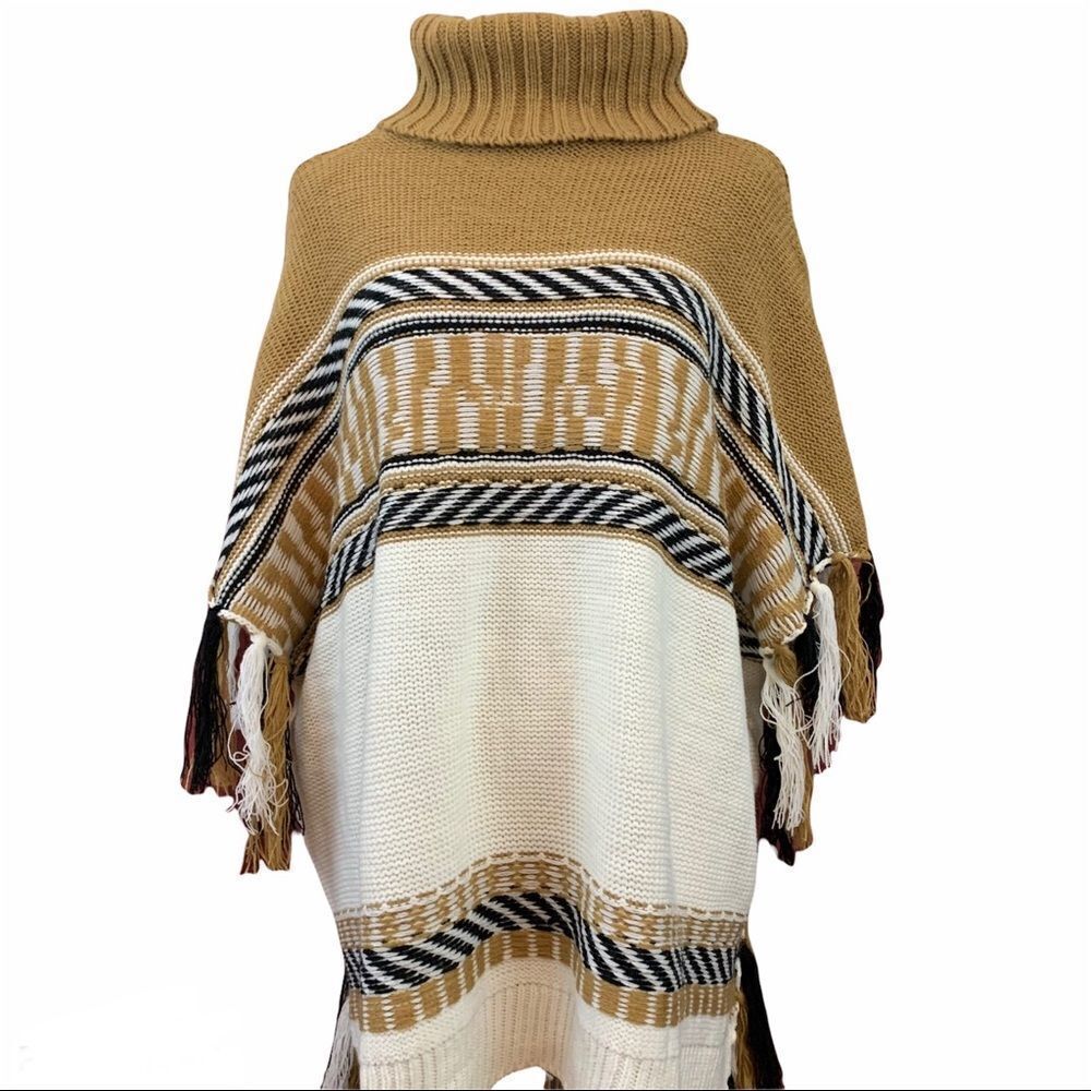 Boutique poncho style striped sweater with fringe